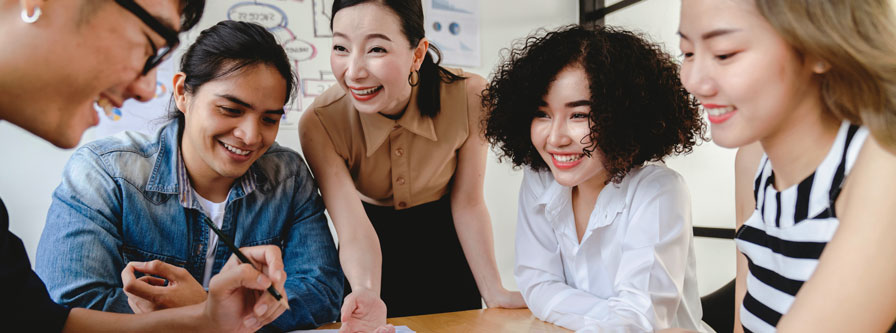 An Asian business team brainstorming.