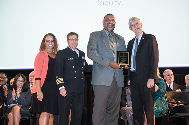 Dr. Trevor K. Archer receives his award at the awards ceremony.