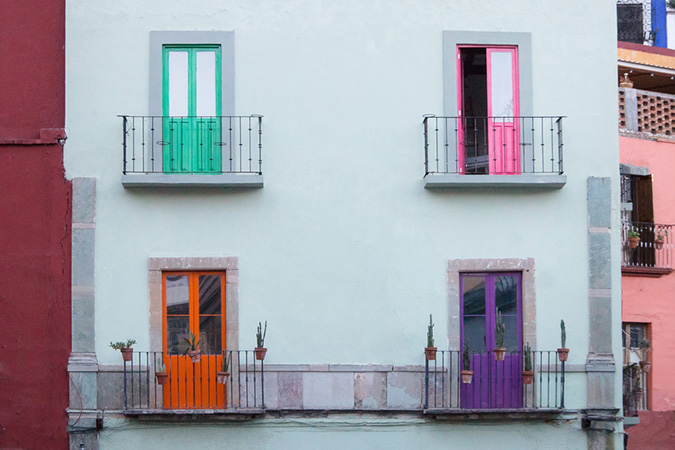 Colorful doors on a white building