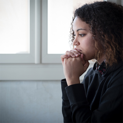 A young lady deep in thought