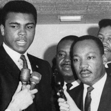 Dr. Martin Luther King, Jr and Muhammad Ali speaking with reporters.