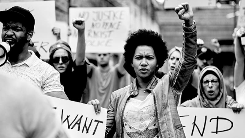 Black and white photo of protestors.